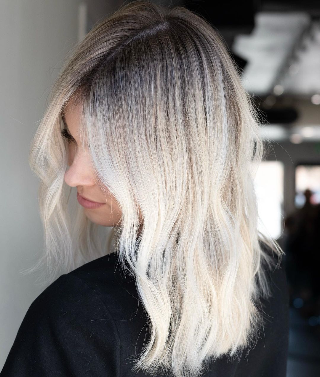 High-Contrast White Blonde Root Stretch